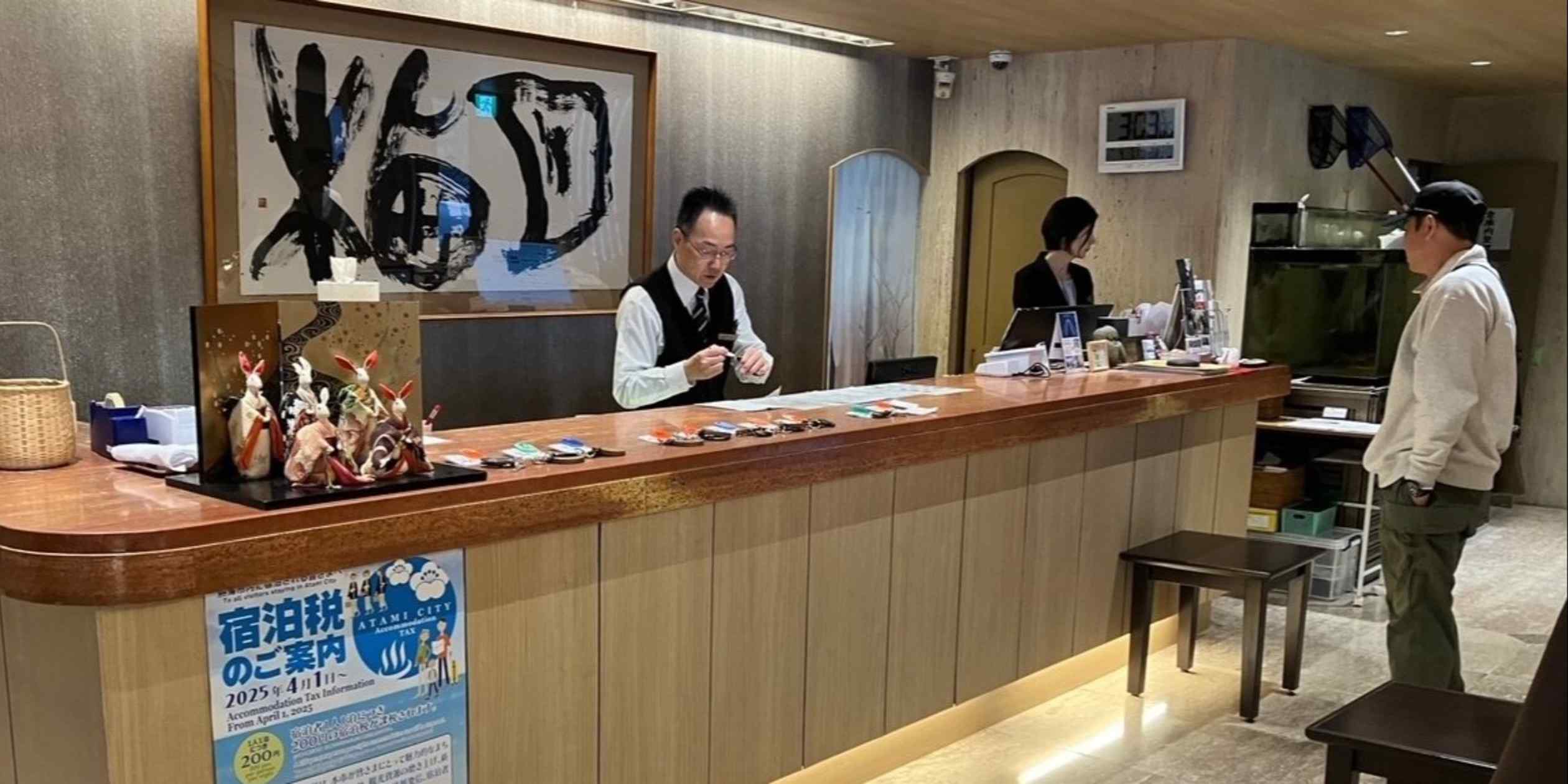 Inundated with tourists, Japanese towns look to taxes on visitors
